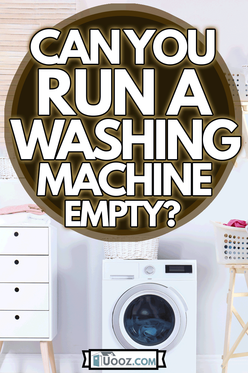 Washing machine with towels in laundry room interior, Can You Run A Washing Machine Empty?