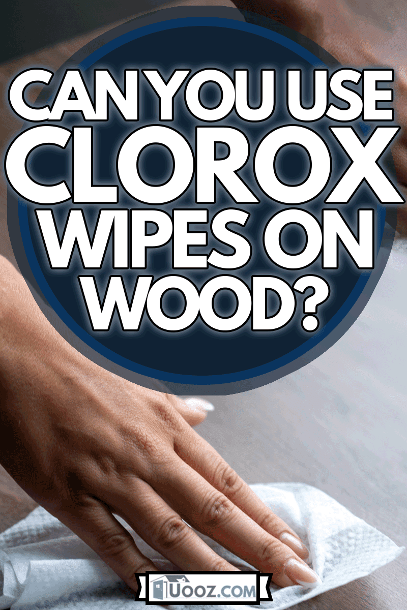 Woman's hand cleaning home office table surface with wet wipes, Can You Use Clorox Wipes On Wood?