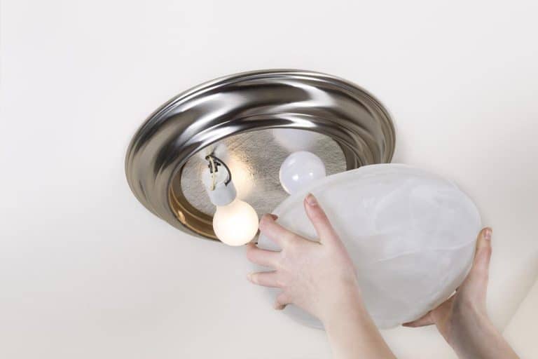 Hands taking of glass lid of ceiling lights, Light Fixture Does Not Cover Hole - What To Do?