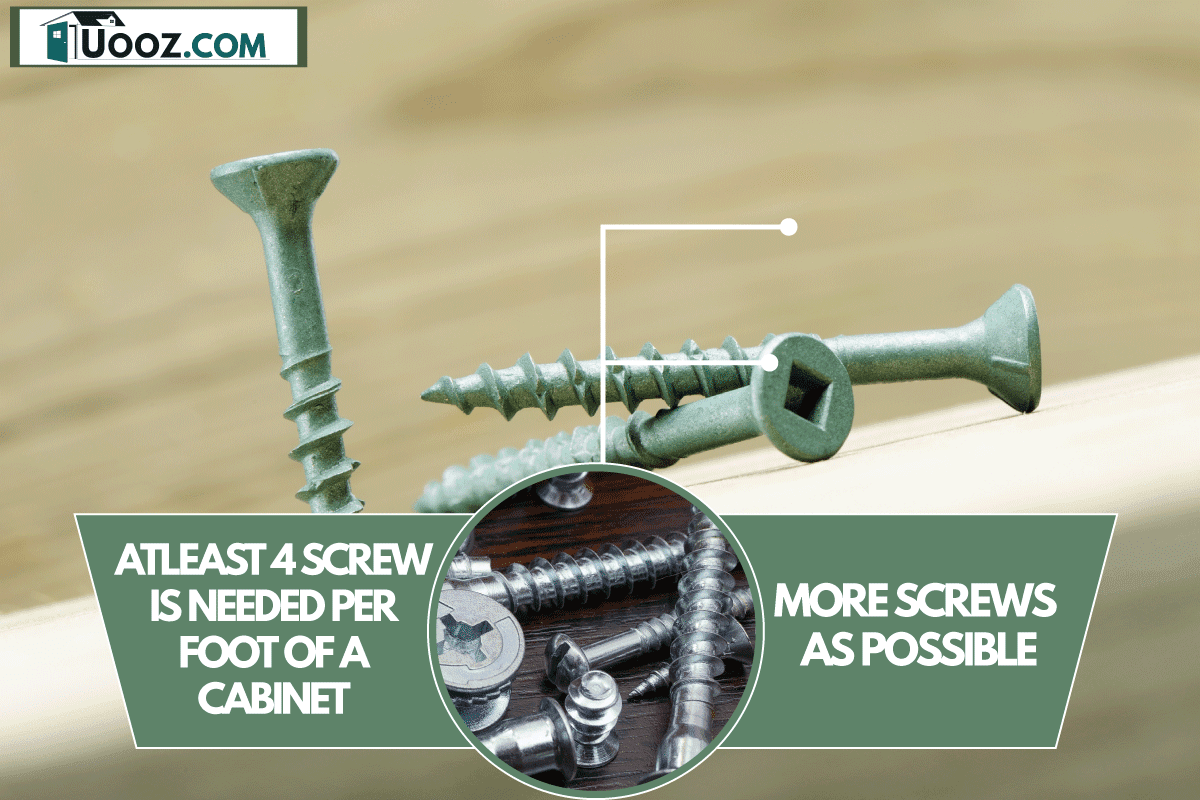 Green coated wood deck screws on a treated wood board, How Many Screws Per Cabinet Do You Need?