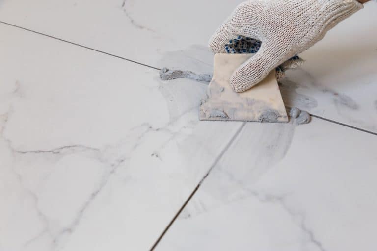 Putting grout on the living room tiles, Can You Put Silicone Over Grout?