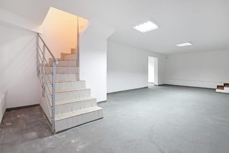 Stairs to empty basement storage room, Should You Drylock Basement Walls And Floor?