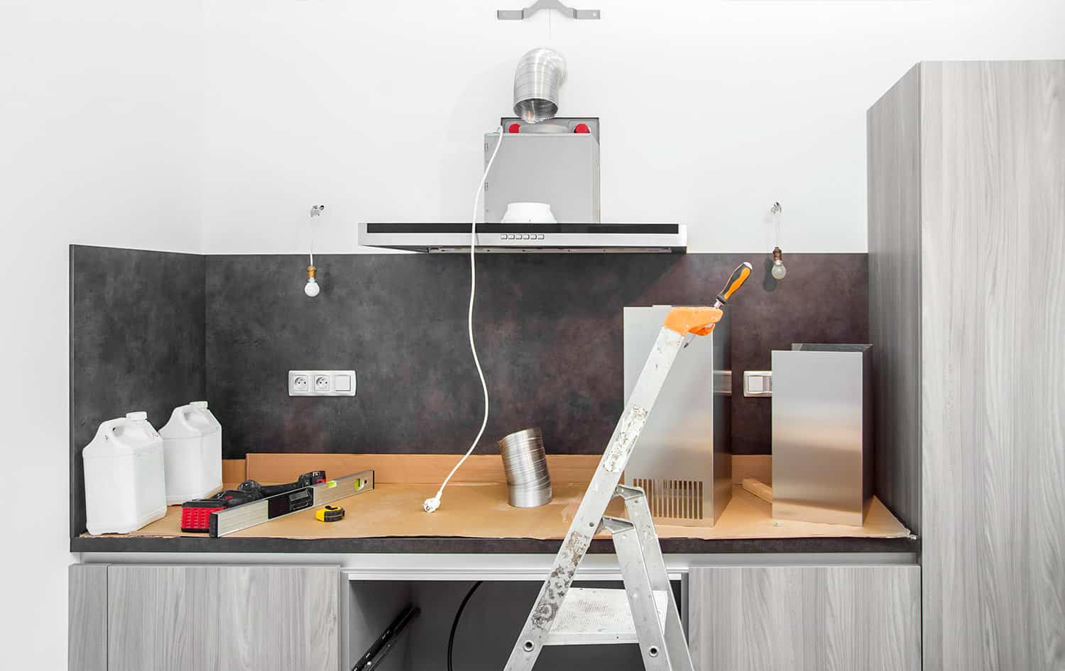 Preparing to install range hood on a modern luxury kitchen