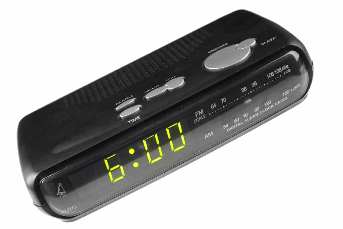 Digital alarm clock radio isolated over white background