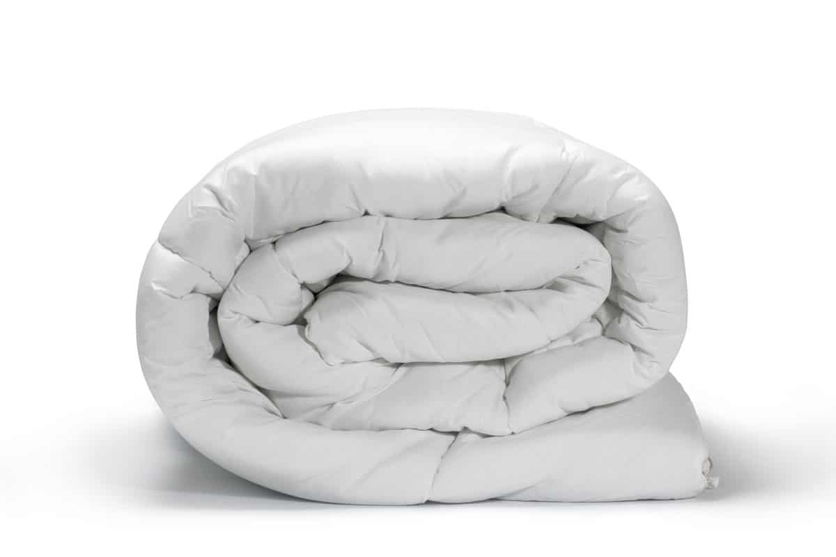 Warm and confortable folded white quilt on white