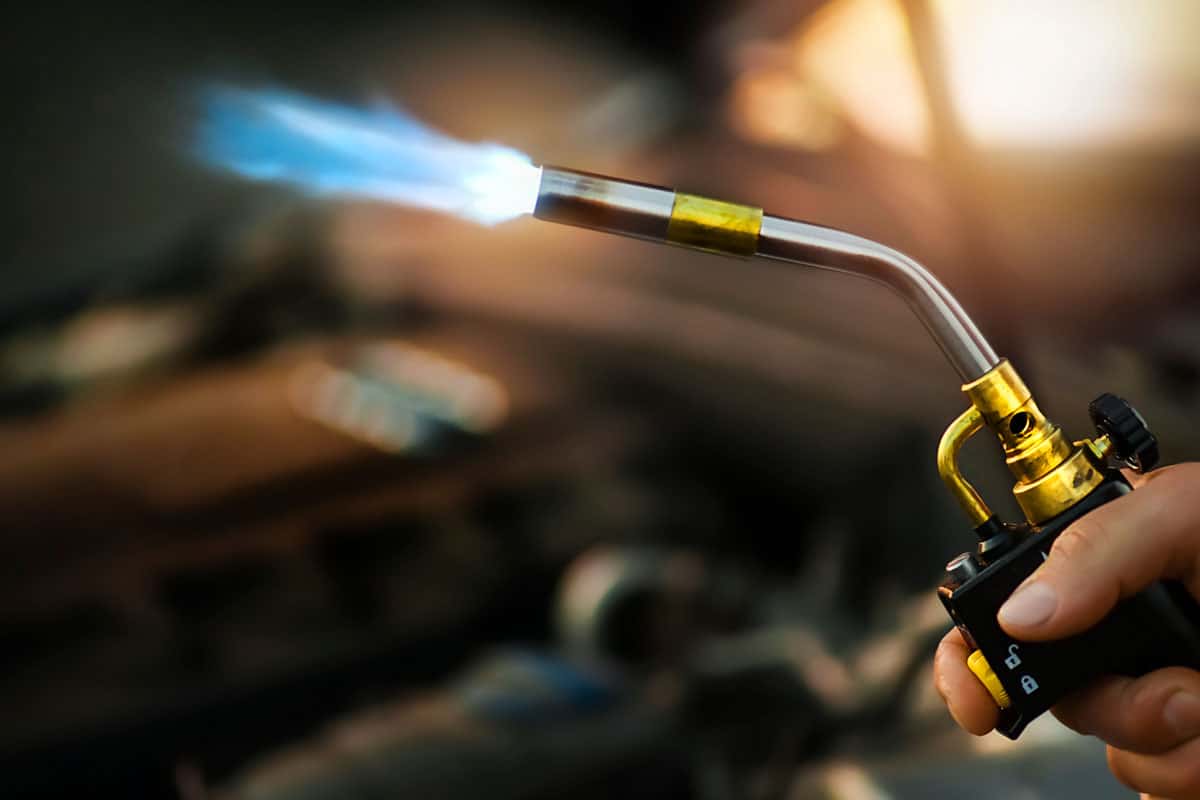 photo of a gas-torch-burner-man-hand-worker