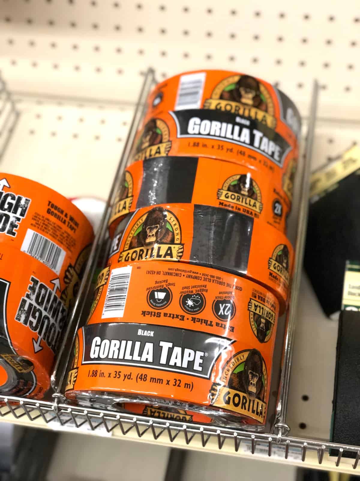 Black Gorilla brand tape in rolls on a shelf in a local supply store.