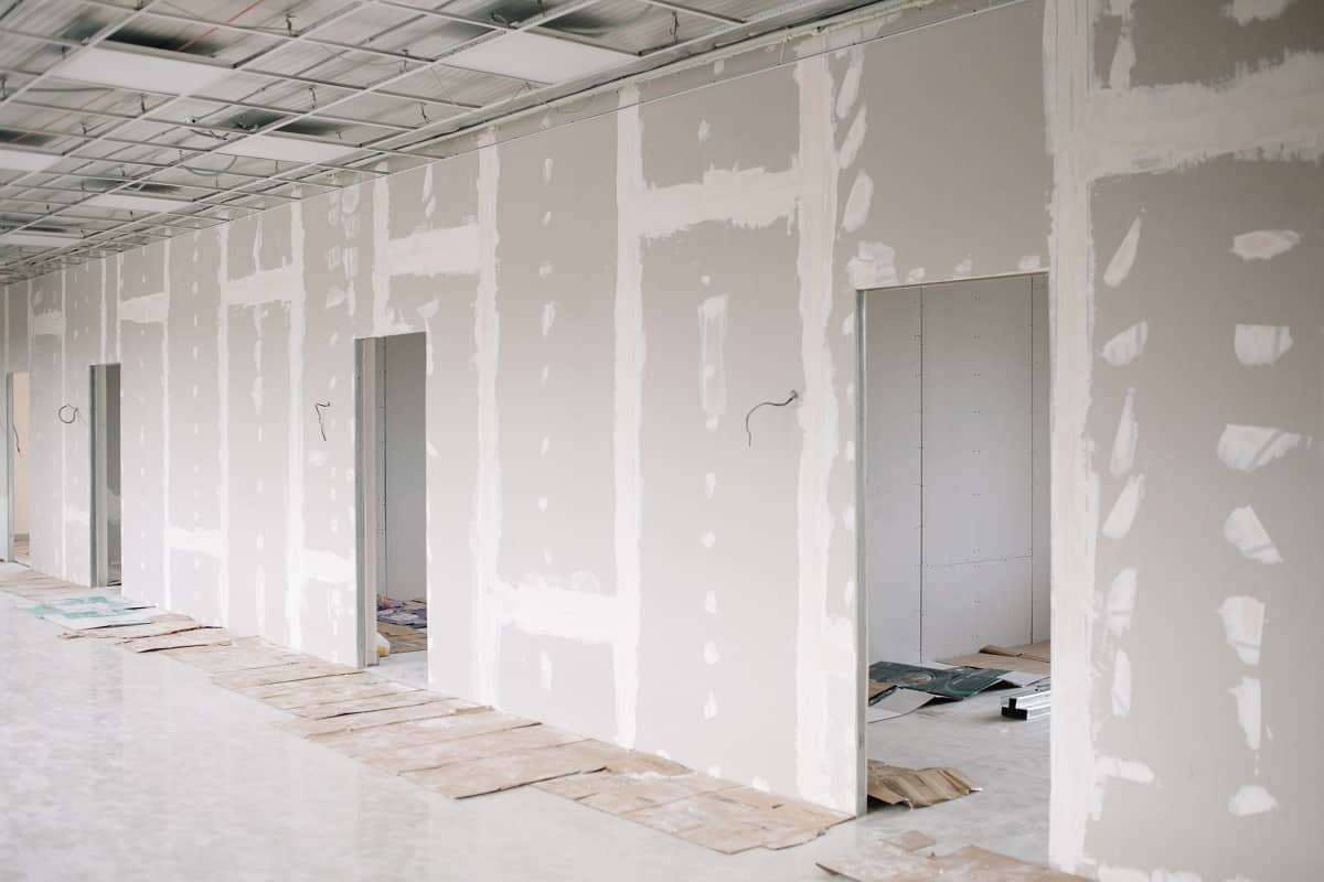 Drywall wall home interior decoration at construction site 