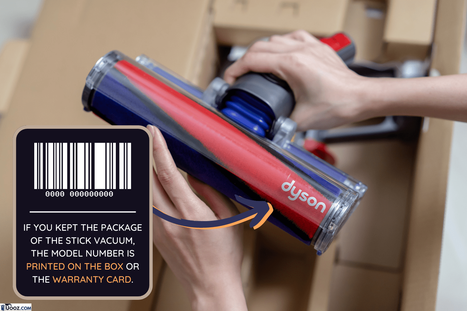 Lady’s hand holding the Soft roller cleaner head of the brand new Dyson Cyclone V10 Fluffy vacuum cleaner during open box - Which Dyson Stick Vacuum Do I Have