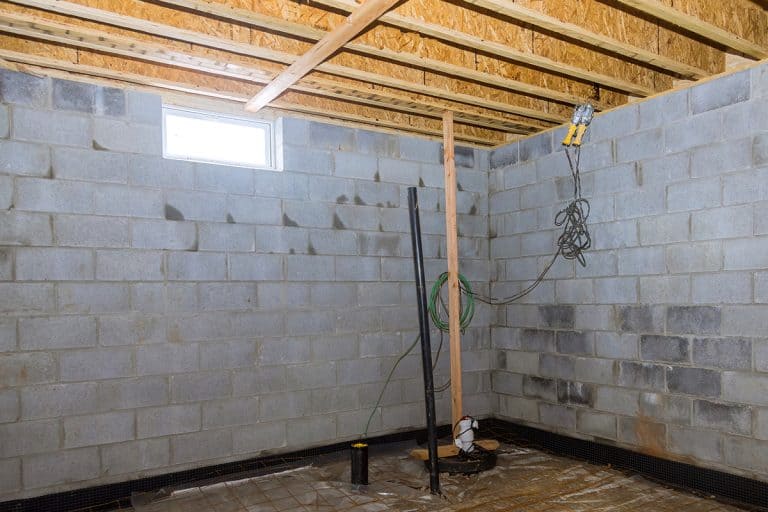 Under construction at the basement for concrete pouring with metal rods connected, How To Finish Basement Walls Without Drywall Or Studs