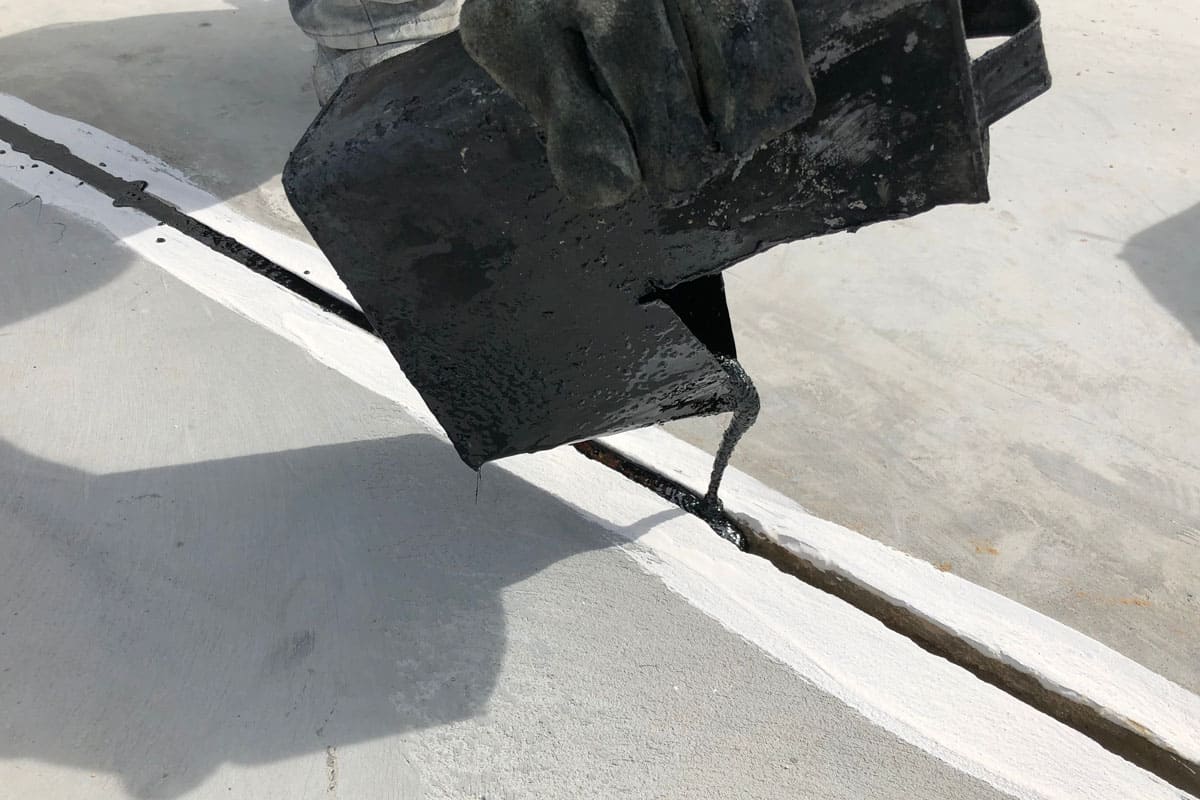 asphalt-joint-sealer-construction-on-concrete