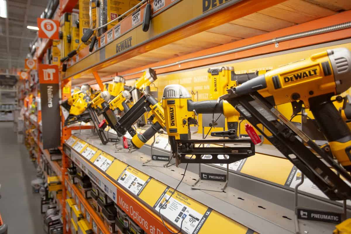 A view of a display of several different DeWalt power tools, seen at a local home improvement store.