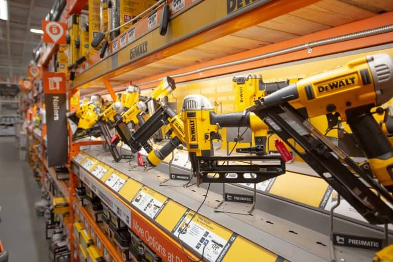 A view of a display of several different DeWalt power tools, seen at a local home improvement store., How To Load A Dewalt Staple Gun [Quickly & Easily]