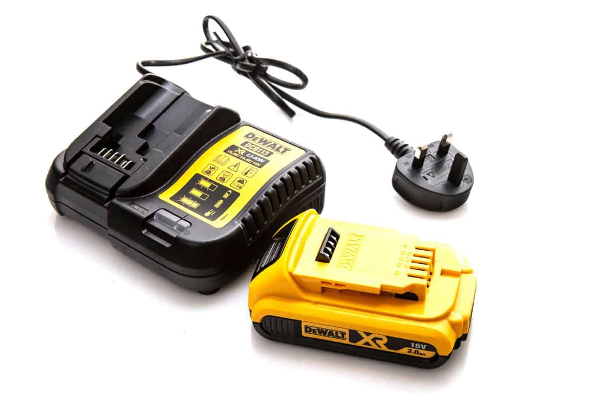 DeWalt DCB113 cordless power tool battery charger and battery on a white background