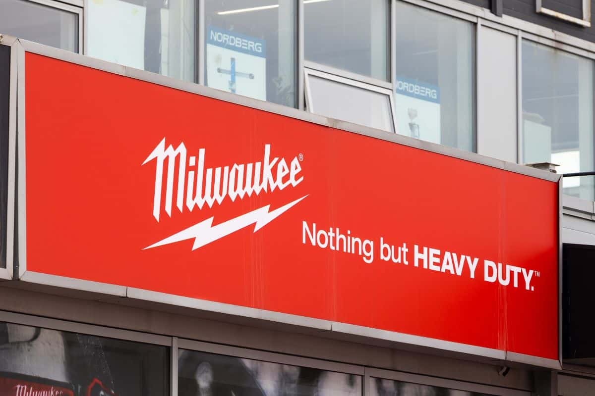Milwaukee brand logo on a wall of a dealer. 'Milwaukee' is a brand of power tools manufactured by the American company Milwaukee Electric Tool Corporation