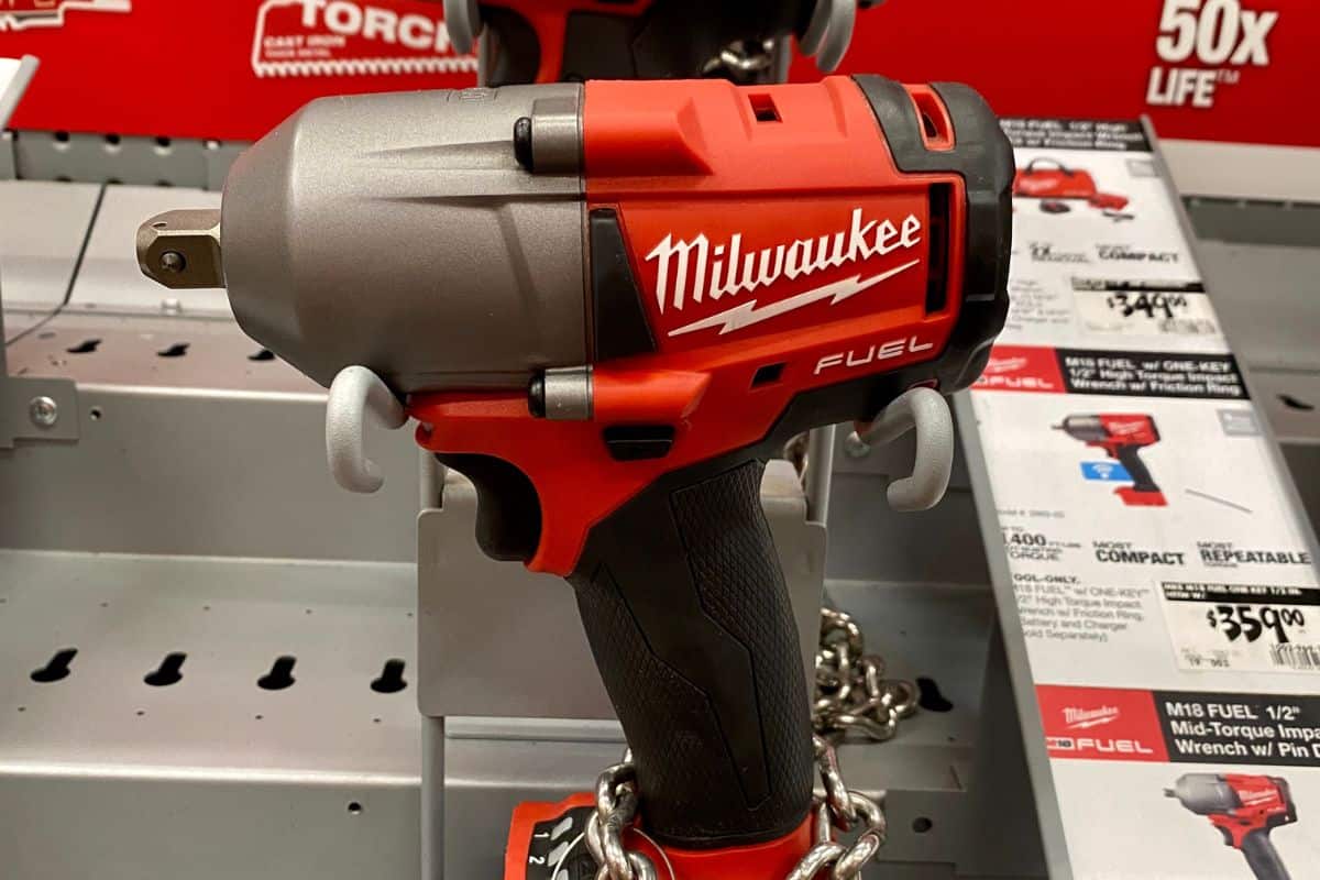 Milwaukee brand of cordless torque tools on display inside Home Depot store.