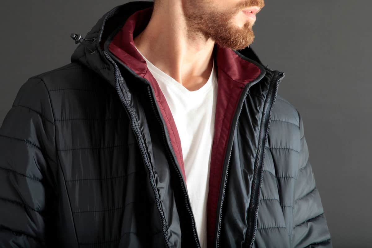 a model guy wearing a stylish heated jacket