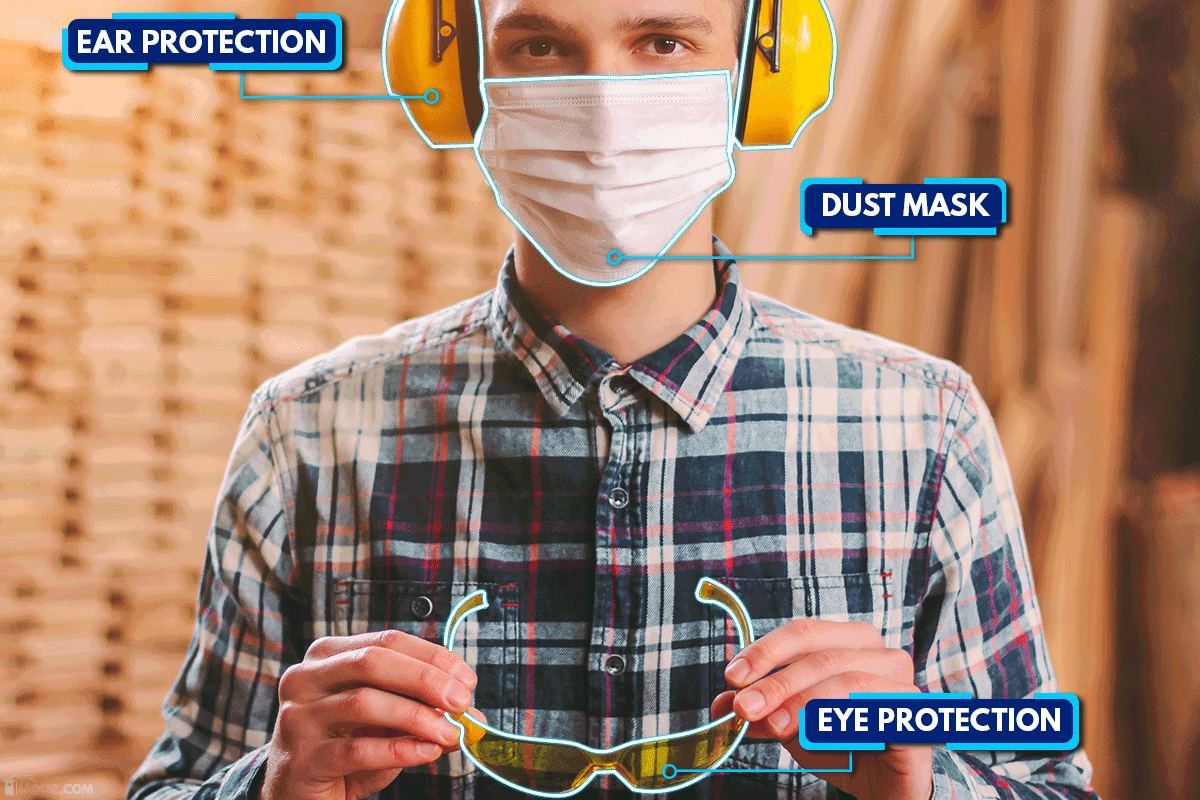Wearing eye and ear protection and a dust mask, How To Use A Dewalt Circular Saw [Step By Step Guide]