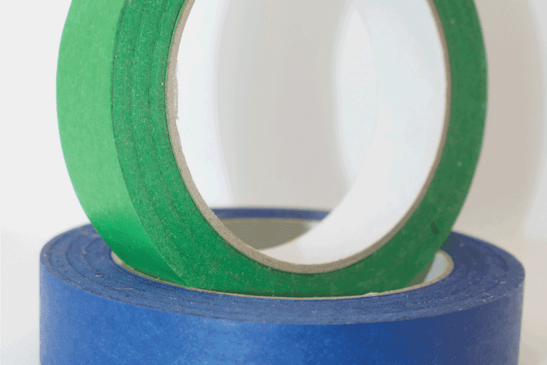green painters tape sitting on blue painters tape. Blue Vs Green Painter's Tape What Are The Differences