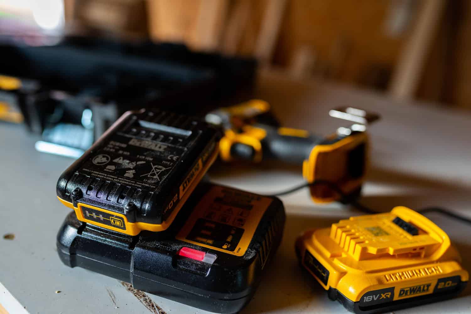 A charger and two DeWalt batteries